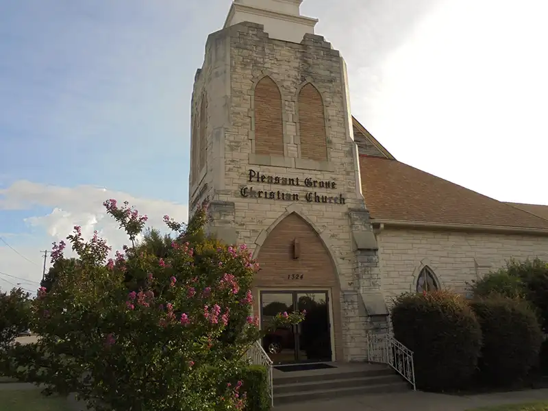 Pleasant Grove Christian Church with new brown shingles on its roof